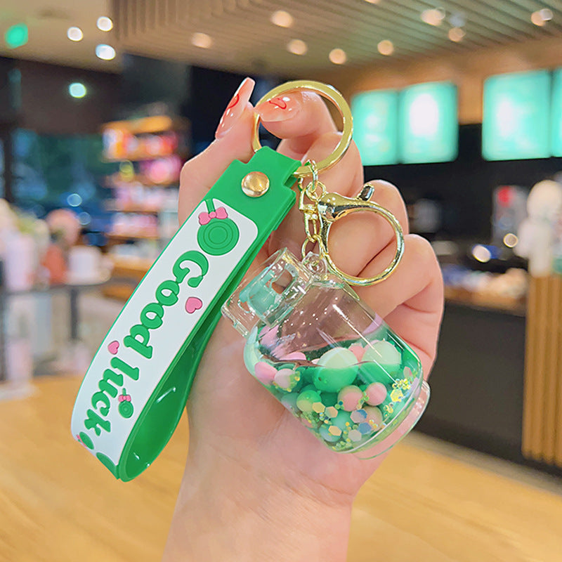Wholesale Green Quicksand Bottle Into Oil Floating Acrylic Keychains